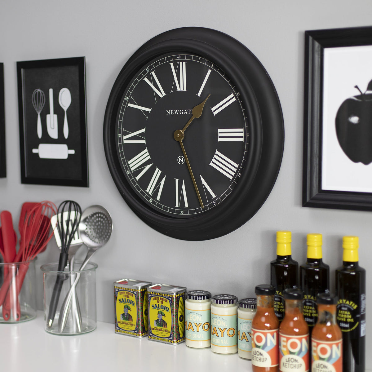 Chocolate Shop Wall Clock | Silicone Cave Black
